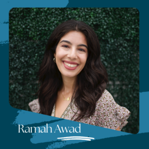 Smiling woman with long, dark wavy hair and a patterned dress, wearing a necklace and hoop earrings, standing in front of a green leafy backdrop; Ramah Awad text on a blue background.